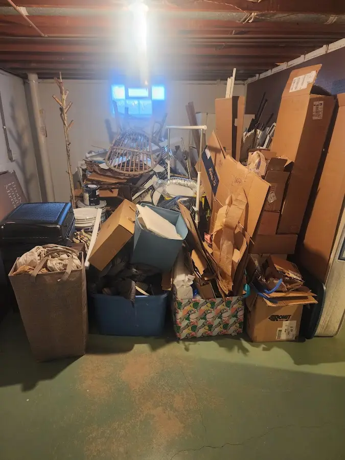 Roll-off dumpster container at job site for 2 Yard Dumpster Rental in Groveland